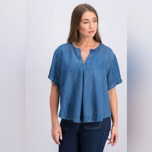 Guess women’s  spilt neck short sleeve denim blue blouse with open back size L